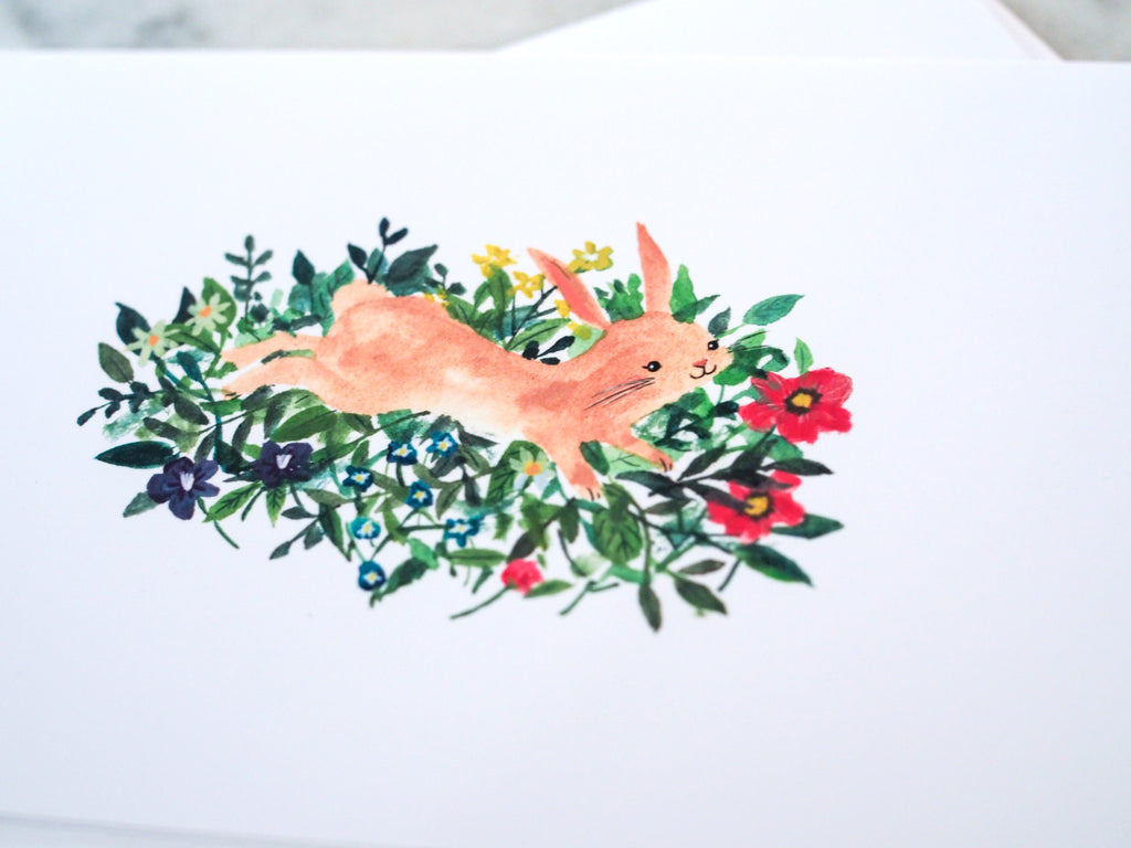 Bunny Jumping in Flowers Card