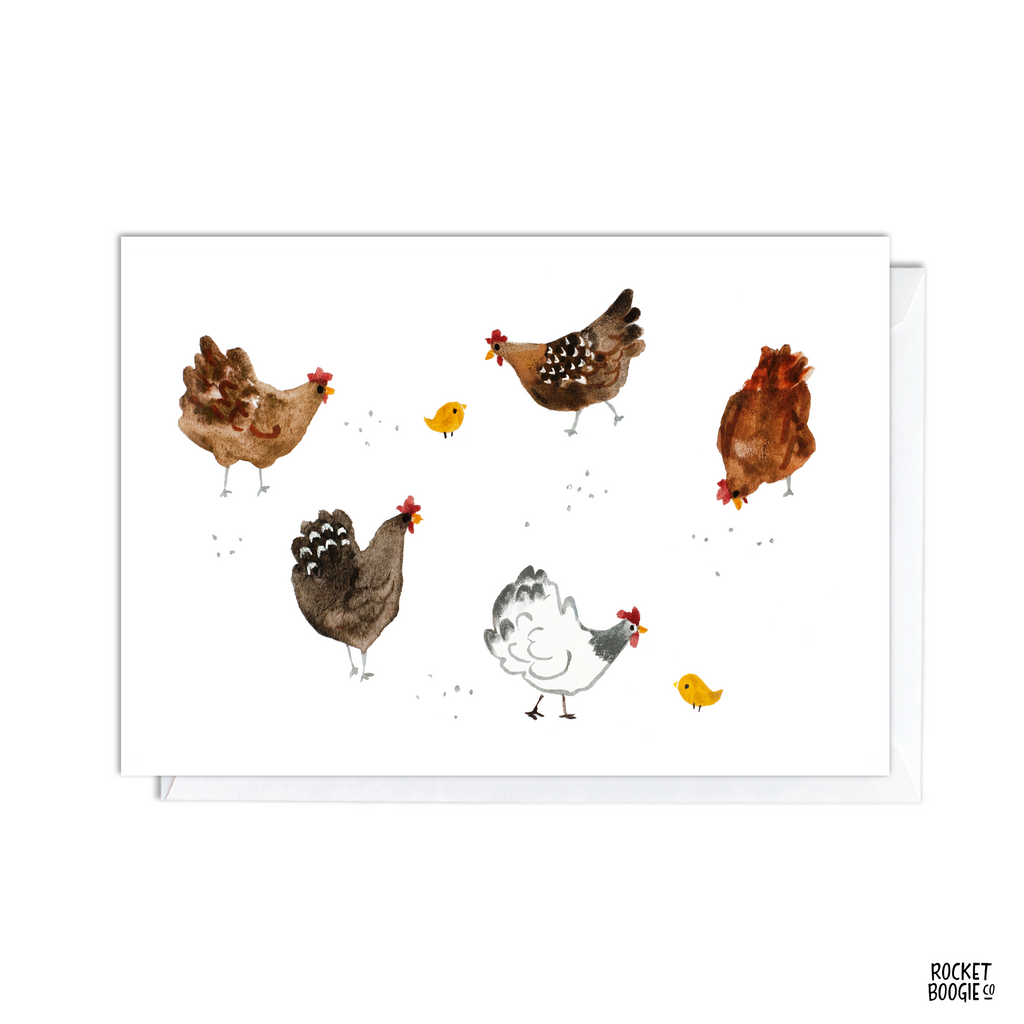 A greeting card featuring an illustration of various chickens and small chicks on the ground.